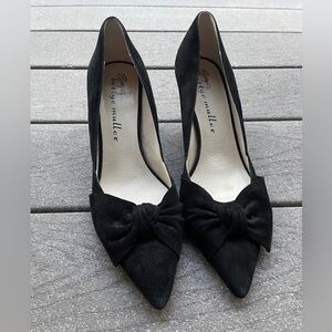 Black velvet heels with bow accent. Size 8.5M.